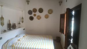 Giường trong phòng chung tại Ijoukak Berber HomeStay