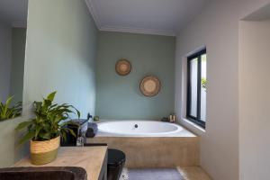 Ванная комната в Muunga Bush Lodge & Spa