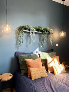 Postel nebo postele na pokoji v ubytování L élégance