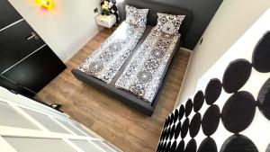 Posteľ alebo postele v izbe v ubytovaní St Emmerich Residence