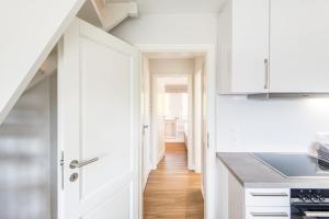 Kuchyň nebo kuchyňský kout v ubytování Haus Weesterhuk Whg 10