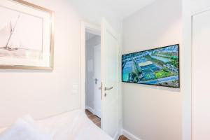 TV a/nebo společenská místnost v ubytování Haus Weesterhuk Whg 10