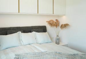 Ένα ή περισσότερα κρεβάτια σε δωμάτιο στο Liine apartment 3008