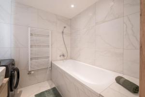 Kúpeľňa v ubytovaní MyFlat Coral 64 Premium Apartment