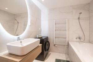 Kúpeľňa v ubytovaní MyFlat Coral 64 Premium Apartment