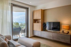 Televízia a/alebo spoločenská miestnosť v ubytovaní MyFlat Coral 64 Premium Apartment
