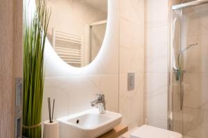 Kúpeľňa v ubytovaní MyFlat Coral 64 Premium Apartment