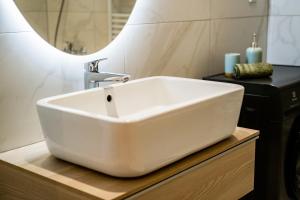 Kúpeľňa v ubytovaní MyFlat Coral 64 Premium Apartment