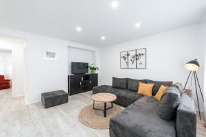 Televízia a/alebo spoločenská miestnosť v ubytovaní Apartment Promenade