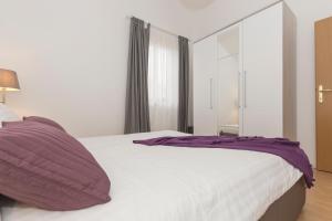 Postel nebo postele na pokoji v ubytování Apartments Agava Romantic