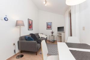 TV a/nebo společenská místnost v ubytování Apartments Agava Romantic
