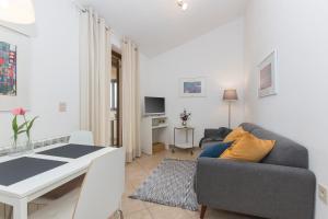 TV a/nebo společenská místnost v ubytování Apartments Agava Romantic
