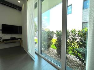 Televízia a/alebo spoločenská miestnosť v ubytovaní St Emmerich Residence