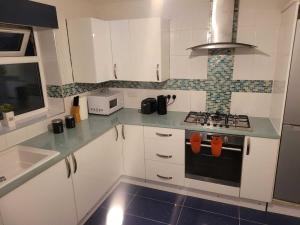 Cuina o zona de cuina de Vetrelax Chelmsford Canberra Apartment