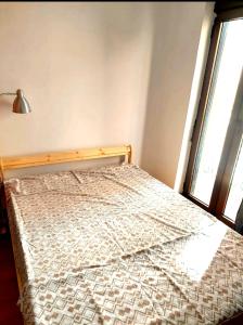 Säng eller sängar i ett rum på 1 CASA TEMPORAL CON TERRAZA EN VALENCIA CAPITAl