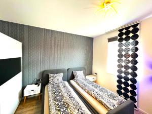 Posteľ alebo postele v izbe v ubytovaní St Emmerich Residence