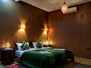 Postel nebo postele na pokoji v ubytování Oasis Tilogui - Luxury hotel in Zagora