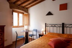 Postel nebo postele na pokoji v ubytování Casa Aurora