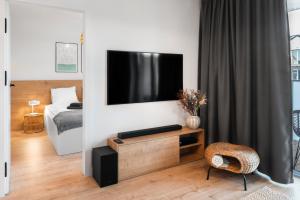 TV a/nebo společenská místnost v ubytování Baltique Apartment