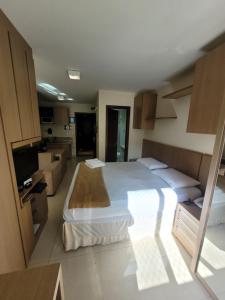 Kuchyň nebo kuchyňský kout v ubytování The Sun Resort By Rei dos Flats