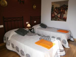 A bed or beds in a room at Balkonpe II