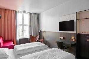 Postel nebo postele na pokoji v ubytování Comfort Hotel Karl Johan
