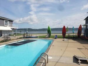a large swimming pool with a view of the water at Single King Room in Lake City