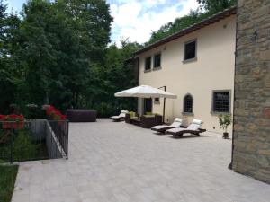 A garden outside BELLA TUSCANY - Residence