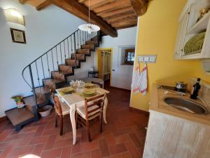 A kitchen or kitchenette at BELLA TUSCANY - Residence