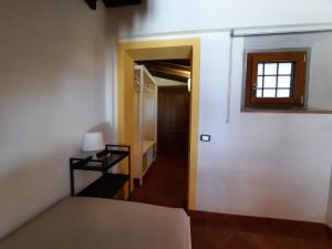 A bed or beds in a room at BELLA TUSCANY - Residence