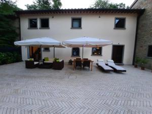 A patio or other outdoor area at BELLA TUSCANY - Residence