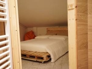 Postel nebo postele na pokoji v ubytování B&B Porto Del Bivio