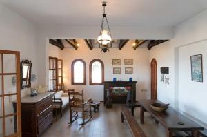 A seating area at Villa Mitsa with stunning view on the Argassi hill
