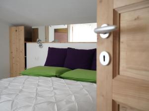 Postel nebo postele na pokoji v ubytování B&B Porto Del Bivio