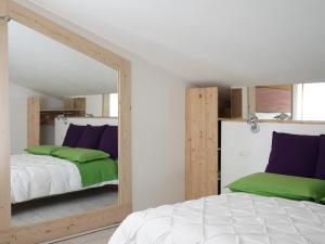 Postel nebo postele na pokoji v ubytování B&B Porto Del Bivio