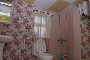 Koupelna v ubytování Ramneek Homestay + 19 fotografií