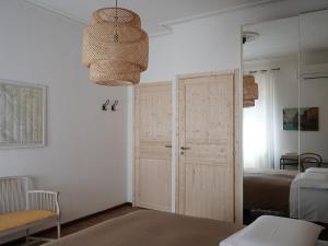 Postel nebo postele na pokoji v ubytování B&B Porto Del Bivio