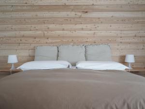 Postel nebo postele na pokoji v ubytování B&B Porto Del Bivio