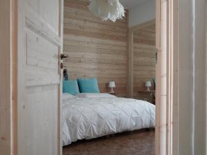 Postel nebo postele na pokoji v ubytování B&B Porto Del Bivio