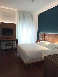 Postel nebo postele na pokoji v ubytování ARVA Spa París + 37 fotografií