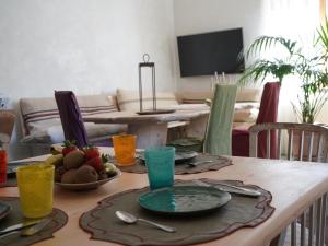 TV a/nebo společenská místnost v ubytování B&B Porto Del Bivio