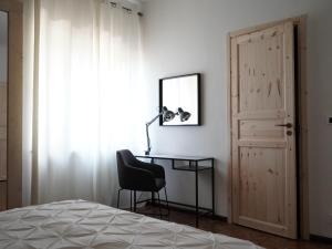 Postel nebo postele na pokoji v ubytování B&B Porto Del Bivio