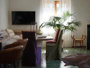 TV a/nebo společenská místnost v ubytování B&B Porto Del Bivio