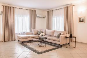 Area soggiorno di Pier Harbour Residences and Spa