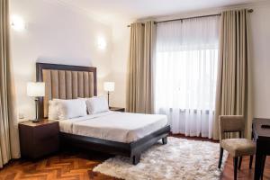 Letto o letti in una camera di Pier Harbour Residences and Spa