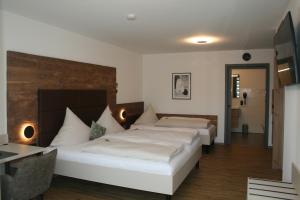 Postel nebo postele na pokoji v ubytování Hotel Bavaria