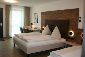 Postel nebo postele na pokoji v ubytování Hotel Bavaria