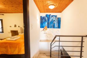 Posteľ alebo postele v izbe v ubytovaní Archontiko Fotini - Traditional Guesthouse Meteora