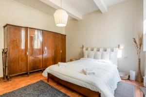 Posteľ alebo postele v izbe v ubytovaní Mercato di Sant'Ambrogio cozy apartment
