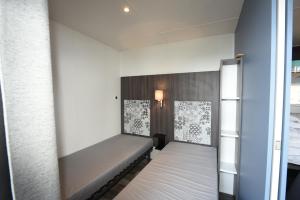 Mobil Home Vue sur Mer - Racine 03客房内的一张或多张床位